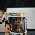 a box with a pop vinyl figure inside of it